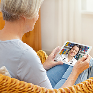DeKalb Medical Group patient using TeleHealth to connect with her provider.